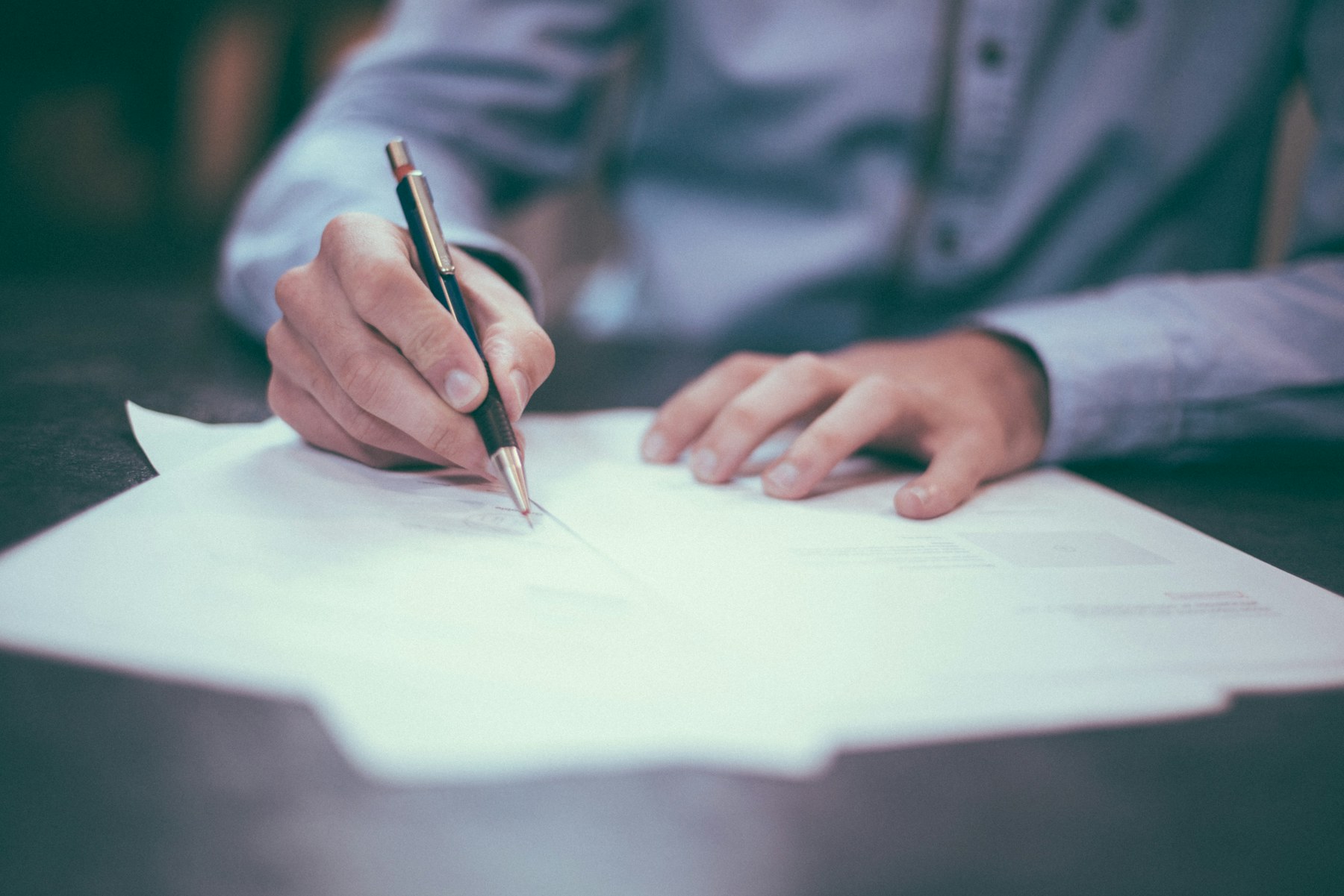 Professionals engaged in compliance-focused learning and document review